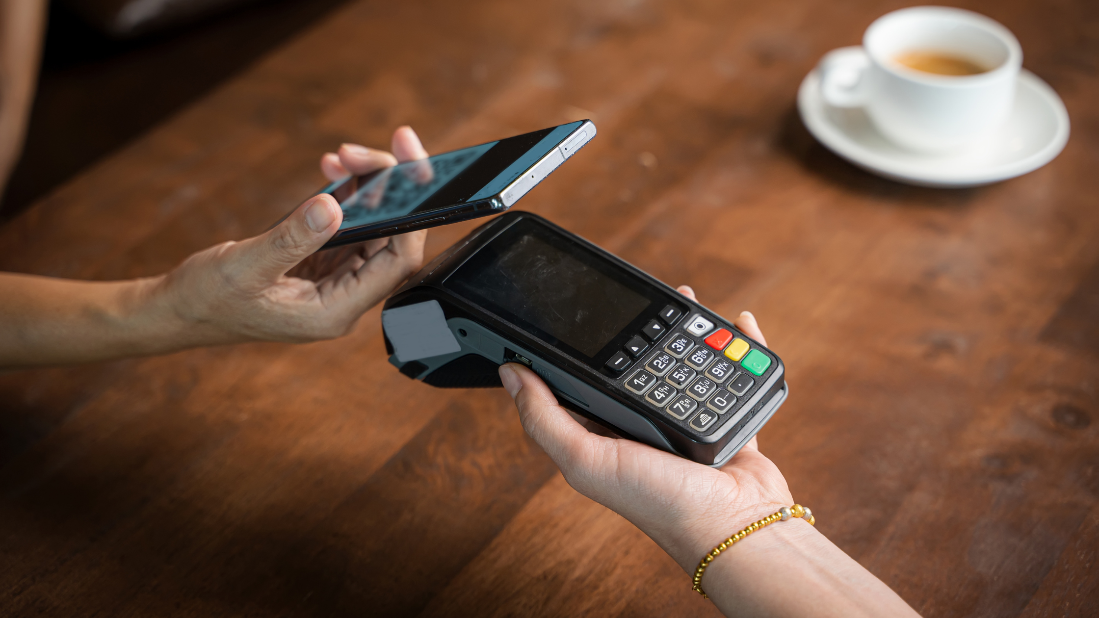 Person paying with their smartphone